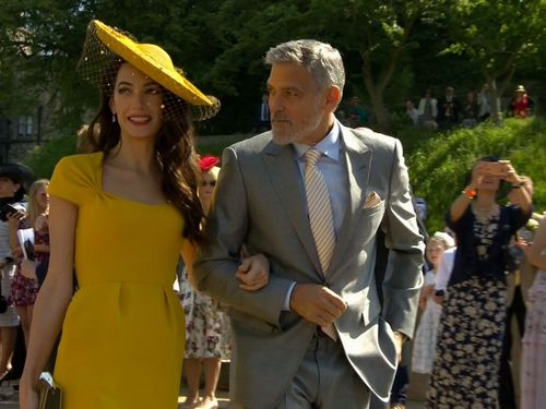 George and Amal Clooney are all smiles as they arrive at the chapel. Picture: Supplied