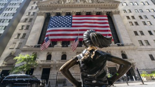 The "Fearless Girl" bronze sculpture looks towards the New York Stock Exchange (Photo: September 22, 2020)