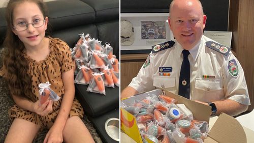 NSW schoolgirl Tamsyn Grillett (left) sent the bushfire care packs to NSW RFS Commission Shane Fitzsimmons. 