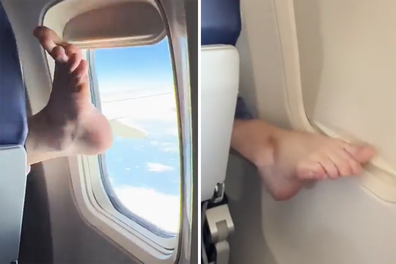 barefoot passenger closes window blind on plane