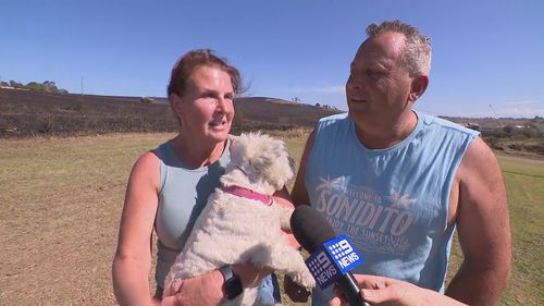 Shane and Annette Morgan's property was saved after they prepared to tackle flames with buckets of water.