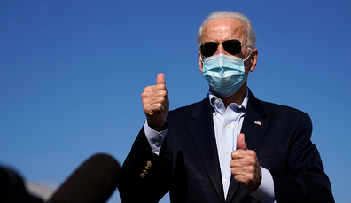 Democratic candidate former Vice President Joe Biden speaks to reporters before boarding his campaign plane at New Castle Airport in New Castle, Del., Thursday, Oct. 22, 2020, en route to Nashville, Tenn., for the final presidential debate against Republican candidate President Donald Trump. (AP Photo/Carolyn Kaster)