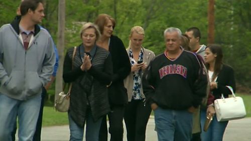 Family of Chris Lane returns to place he was gunned down after first day of trial