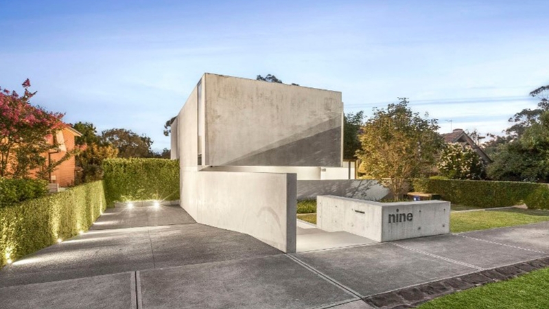 Concrete is balanced with glass and steel at this $6m Melbourne home