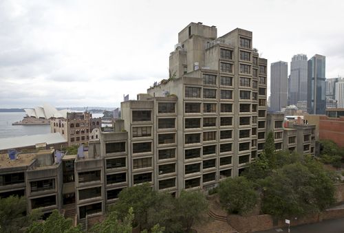 The Sirius building, constructed in the Brutalist style, overlooks the harbor and Opera House in Sydney. (AAP)