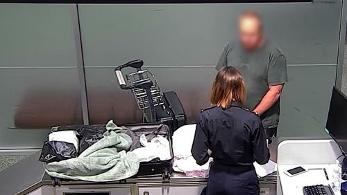A man from the Gold Coast being arrested at Brisbane Airport for allegedly trying to import meth.