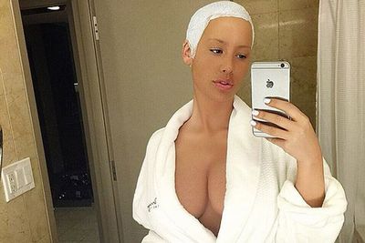 Flashing a lot of cleavage in her first selfie of 2015.