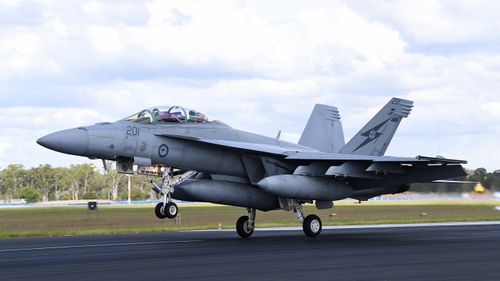 Jet fighter forced to make emergency landing at Brisbane Airport