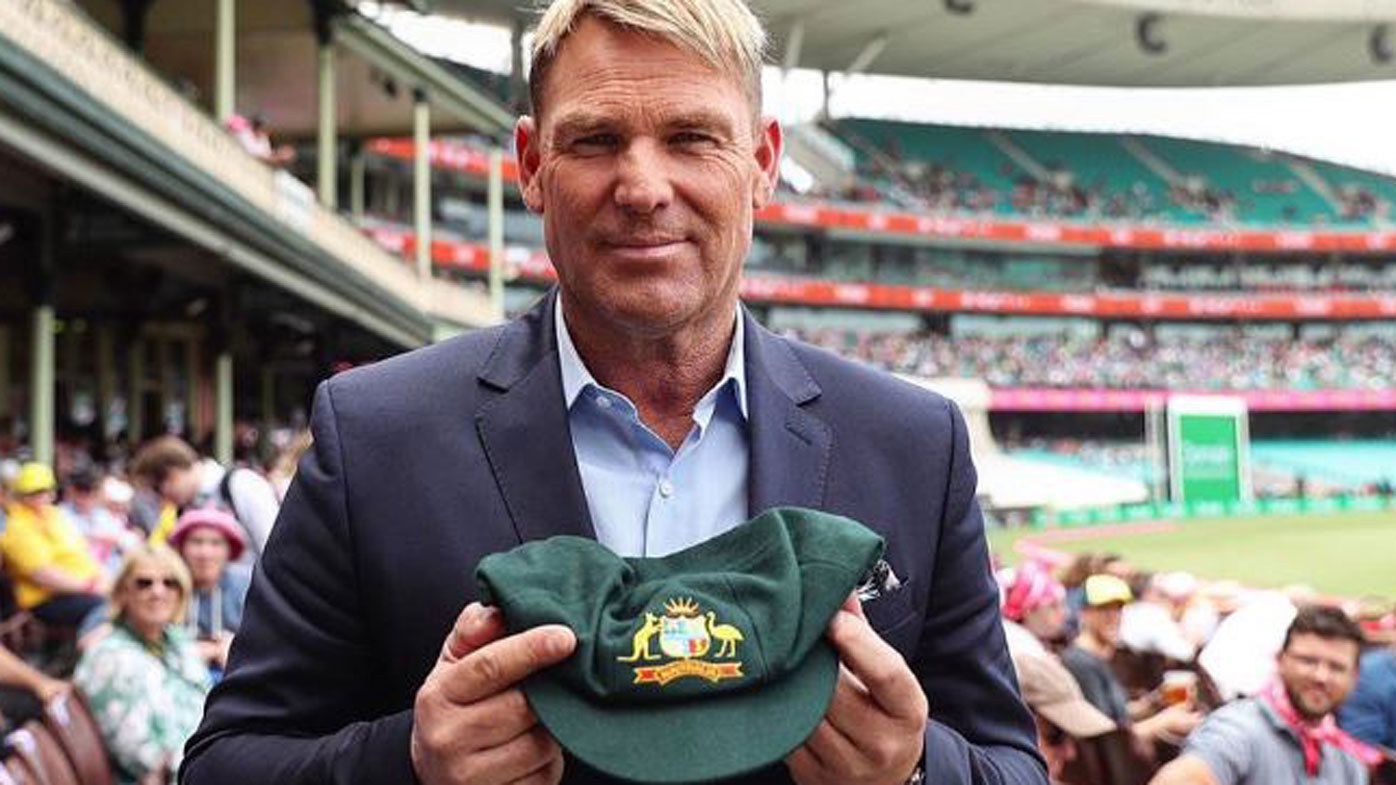 Shane Warne with his baggy green cap.