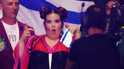 Netta from Israel poses for a camera man in Lisbon, Portugal. (Picture: AP)