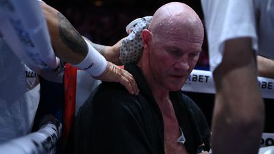 Hall apologises to fight fans