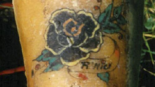 The flower tattoo on Rita Roberts