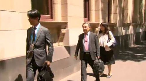 The family of 25-year-old Japanese student Yosuke Kanno enter the court. 