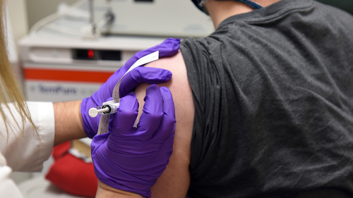 The first patient enrolled in Pfizer's COVID-19 coronavirus vaccine clinical trial gets the jab at the University of Maryland School of Medicine in Baltimore on May 4, 2020.   (University of Maryland School of Medicine via AP, File)