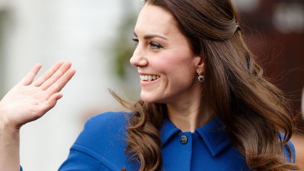 Duchess of Cambridge Kate Middleton steps out in a cobalt blue coat - eerily similar to one Princess Di wore. Image: Getty.