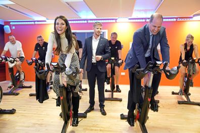 Prince William, Prince of Wales and Catherine, Princess of Wales take part in a spin class during a visit to Aberavon Leisure and Fitness Centre in Port Talbot, to meet local communities and hear about how sport and exercise can support mental health and wellbeing on February 28, 2023 in Port Talbot, United Kingdom. 