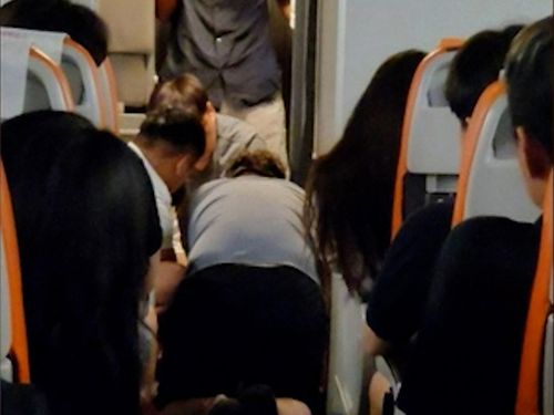 A 19-year-old Korean man tried to open a plane door mid-flight after complaining that he felt "pressure" on his chest, but luckily, the cabin crew stopped him.The passenger, who was on a red-eye flight from Cebu in the Philippines to Seoul, South Korea, was "acting strangely" about an hour into the flight, so he was moved to the front row of the plane close to the exit door where staff could monitor him, officials from Jeju Airlines said.
