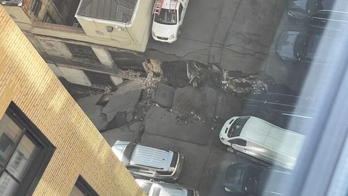 This photo provided by Charlie Franklin shows the partially collapsed parking garage in lower Manhattan.