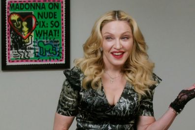 Madonna reacting to Richard Wilkins accepting her drinking challenge.