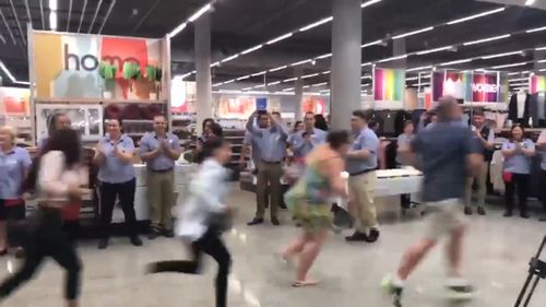 Crowds run into new Kmart store at Coffs Harbour this morning. (9NEWS)