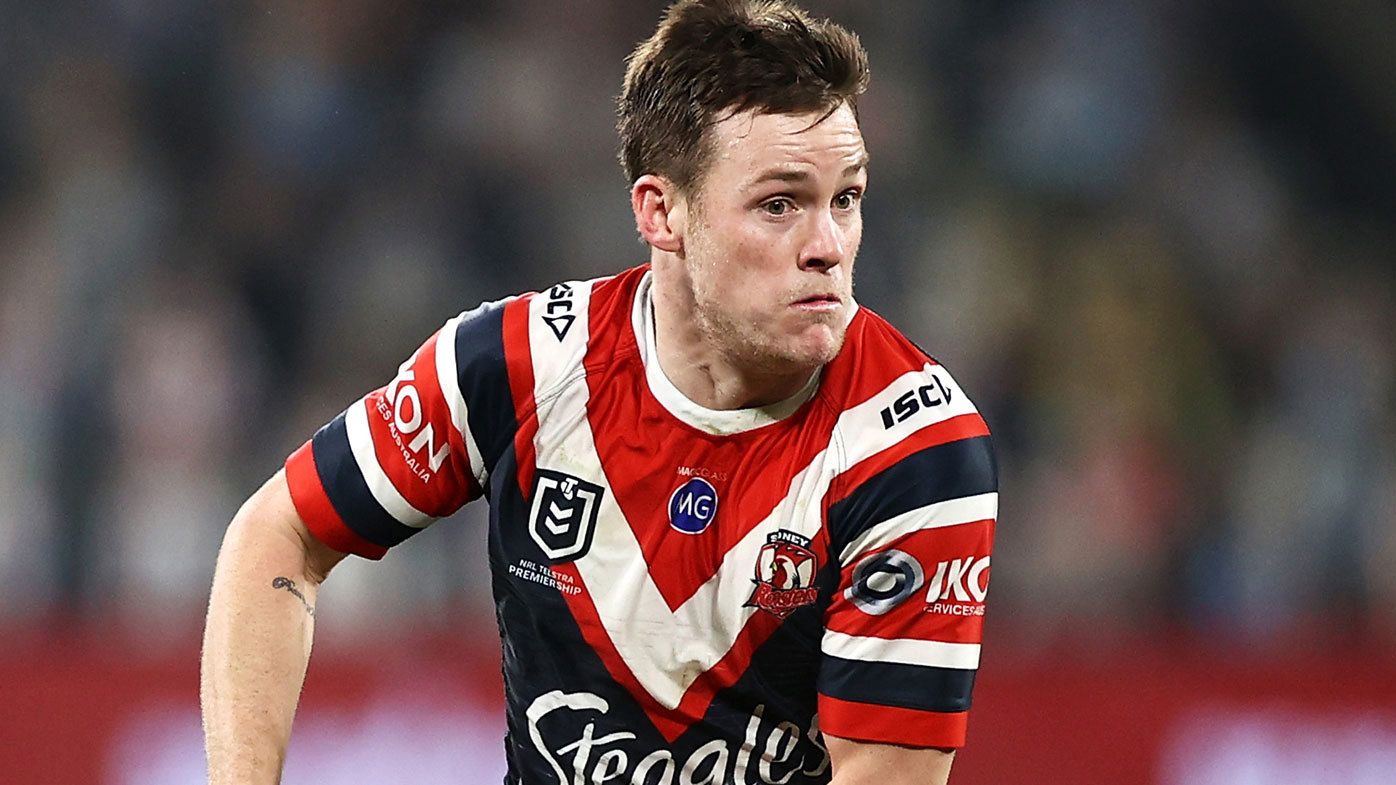 Luke Keary of the Roosters runs the ball 