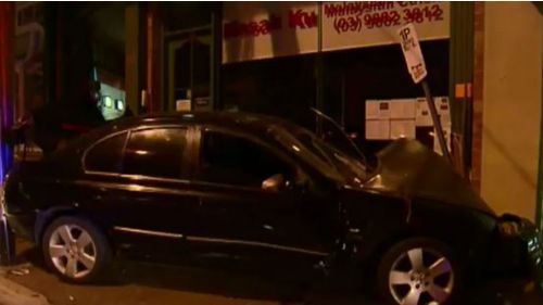 The car took out a ticket machine and crashed into a wall on Burke Road. (9NEWS)