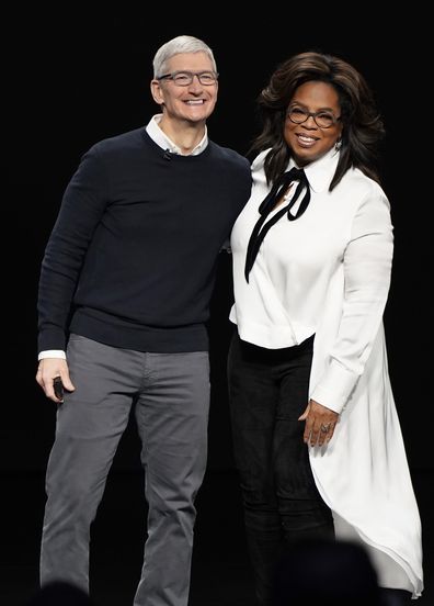 Apple CEO Tim Cook and Oprah Winfrey.