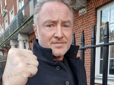Riverdance star Michael Flatley assures fans he is 'on the mend' after cancer diagnosis.