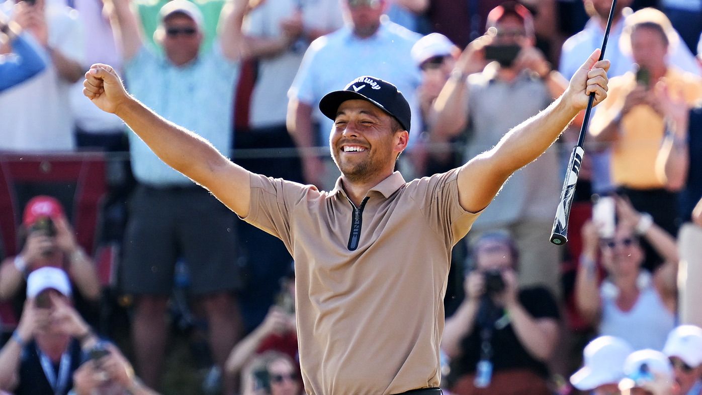 Xander Schauffele of the United States celebrates after winning on the 18th green during the final round of the 2024 PGA Championship at Valhalla Golf Club on May 19, 2024 in Louisville, Kentucky. (Photo by Ross Kinnaird/Getty Images)