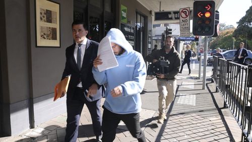 A-League player Clayton Lewis leaving Parramatta court after being arrested on betting corruption charges. MAY 17, 2024. Photo: EDWINA PICKLES