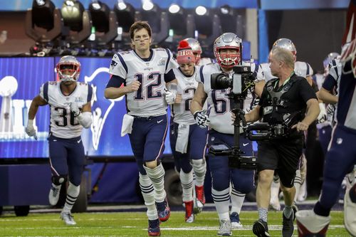 New England Patriots quarterback Tom Brady takes the field. (AAP)