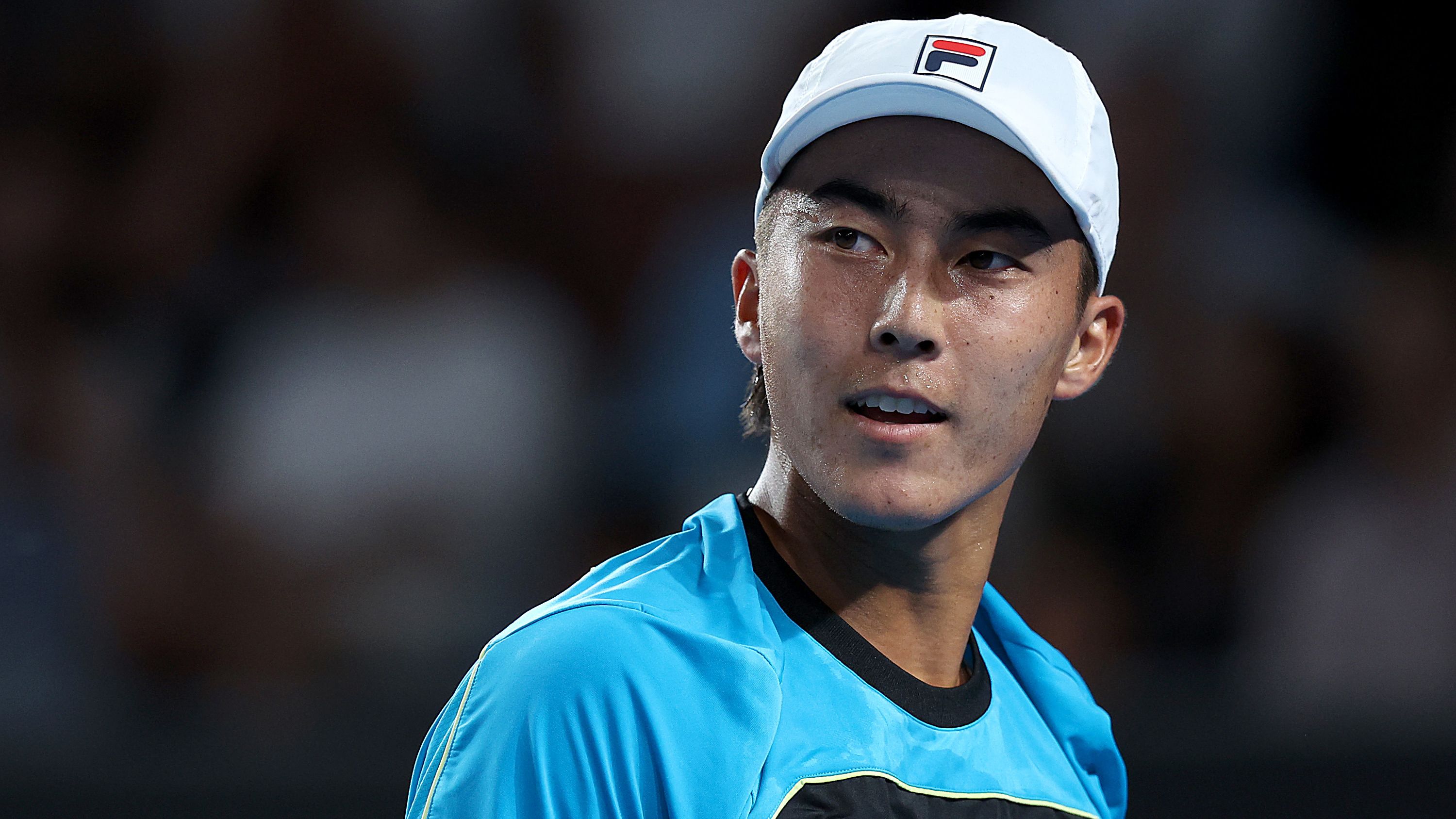 Rinky Hijikata of Australia looks on in their round one singles match against Jan-Lennard Struff of Germany during the 2024 Australian Open at Melbourne Park on January 15, 2024 in Melbourne, Australia. (Photo by Daniel Pockett/Getty Images)
