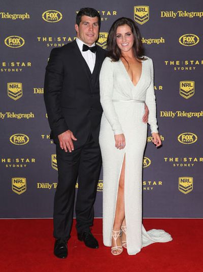 Folowed by club and NSW teammate Michael Ennis and wife Simone Ennis. (Getty)
