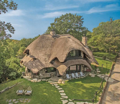 Quirky 'Mushroom House' in Michigan with a thatched roof goes on the market for $6.4 million