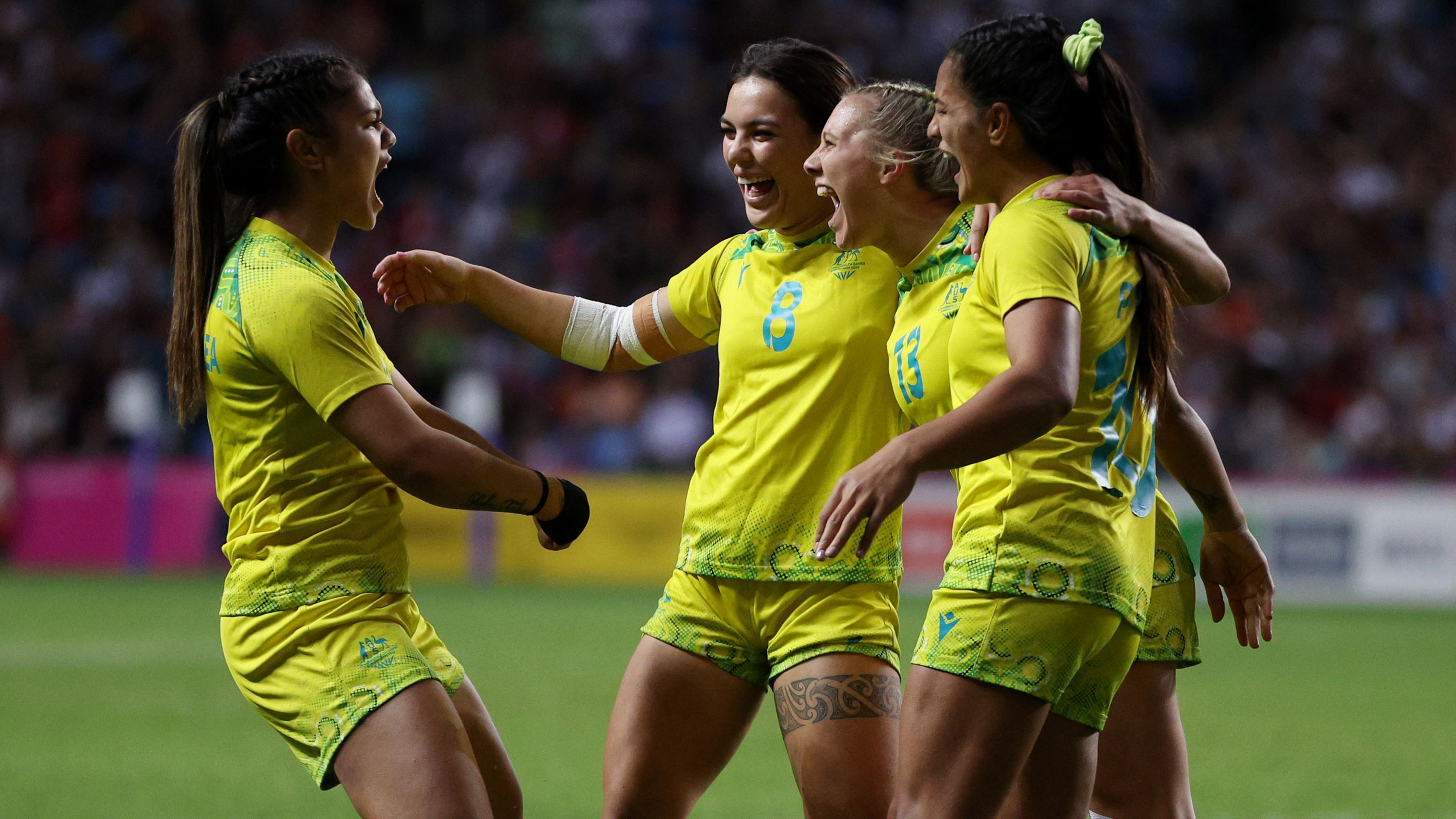Alysia Lefau-Fakaosilea, Madison Ashby, Sariah Paki and Teagan Levi of Team Australia celebrate following the Women&#x27;s Gold Medal Match between Team Australia and Team Fiji.