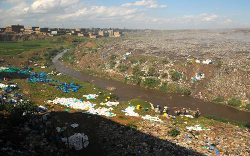 Plastic bags and other litter on the banks of a river near Mukuru slum in Kenya. Plastic bags are now banned in Kenya, with abusers facing prison or large fines. (Getty)