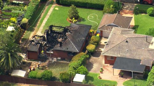 The house on fire is next door to a school in Baulkham Hills.