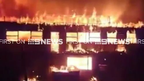 At least six shops have been destroyed in the Farfield fire. (9NEWS)