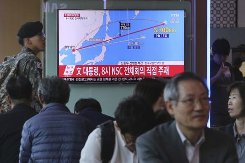 People watch a TV screen reporting a North Korea's missile launch, at the Seoul Railway Station in Seoul, South Korea. (AP)