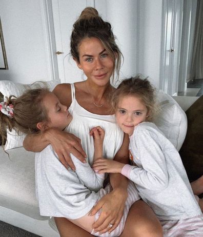 Influencer Sophie Guidolin with her twin daughters.