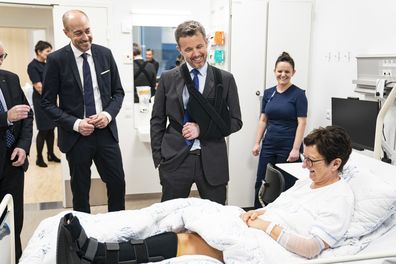 Prince Frederik returns to work with arm in a sling after skiing accident 