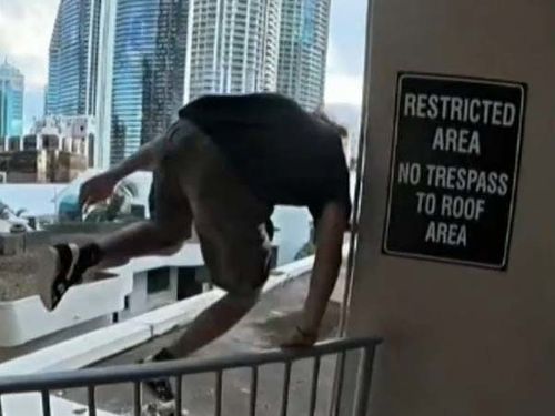 An online video has brought to light a series of dangerous stunts by a trio on the Gold Coast.The video, posted to social media, shows the individuals allegedly breaking into the Sands Apartment building before jumping between the roofs of buildings.