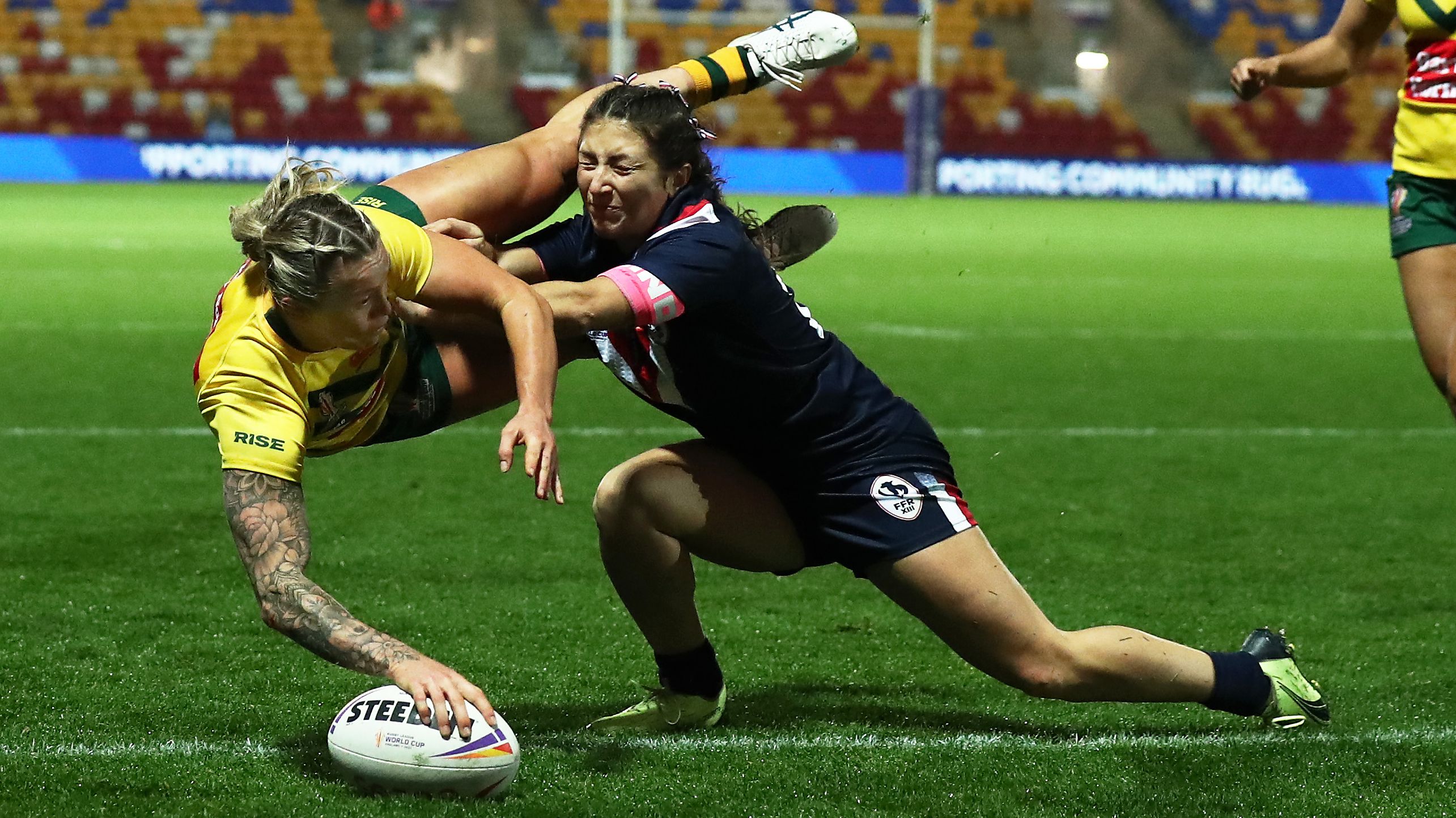 Julia Robinson goes over to score the Jillaroos&#x27; hat trick try against the Kiwi ferns.