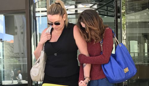 Aimee Cummins (right) leaves Perth Magistrates Court on Wednesday, January 16, 2019 after she was sentenced to seven months in prison, suspended for 12 months, for receiving a meerkitten her friend stole from Perth Zoo