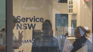 A Service NSW staff member is in hospital after he was stabbed in Sydney&#x27;s CBD this morning.
