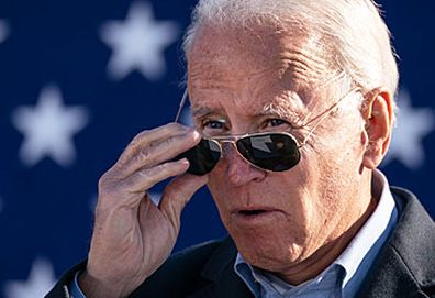 Joe Biden removing sunglasses (Getty)