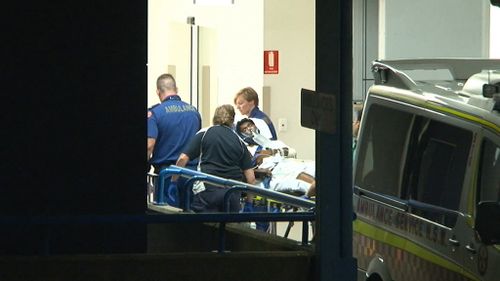 The man is admitted to hospital with stab wounds. (9NEWS)