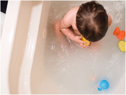 Rosie was left unattended in the bath with her twin brother while her mother was distracted on the phone.