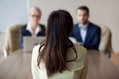 Businesswoman and businessman HR manager interviewing woman. Job interview.