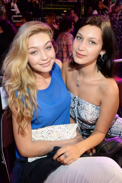 Gigi Hadid (left) and Bella Hadid attend Nickelodeon's 27th Annual Kids' Choice Awards held at USC Galen Center on March 29, 2014 in Los Angeles, California.